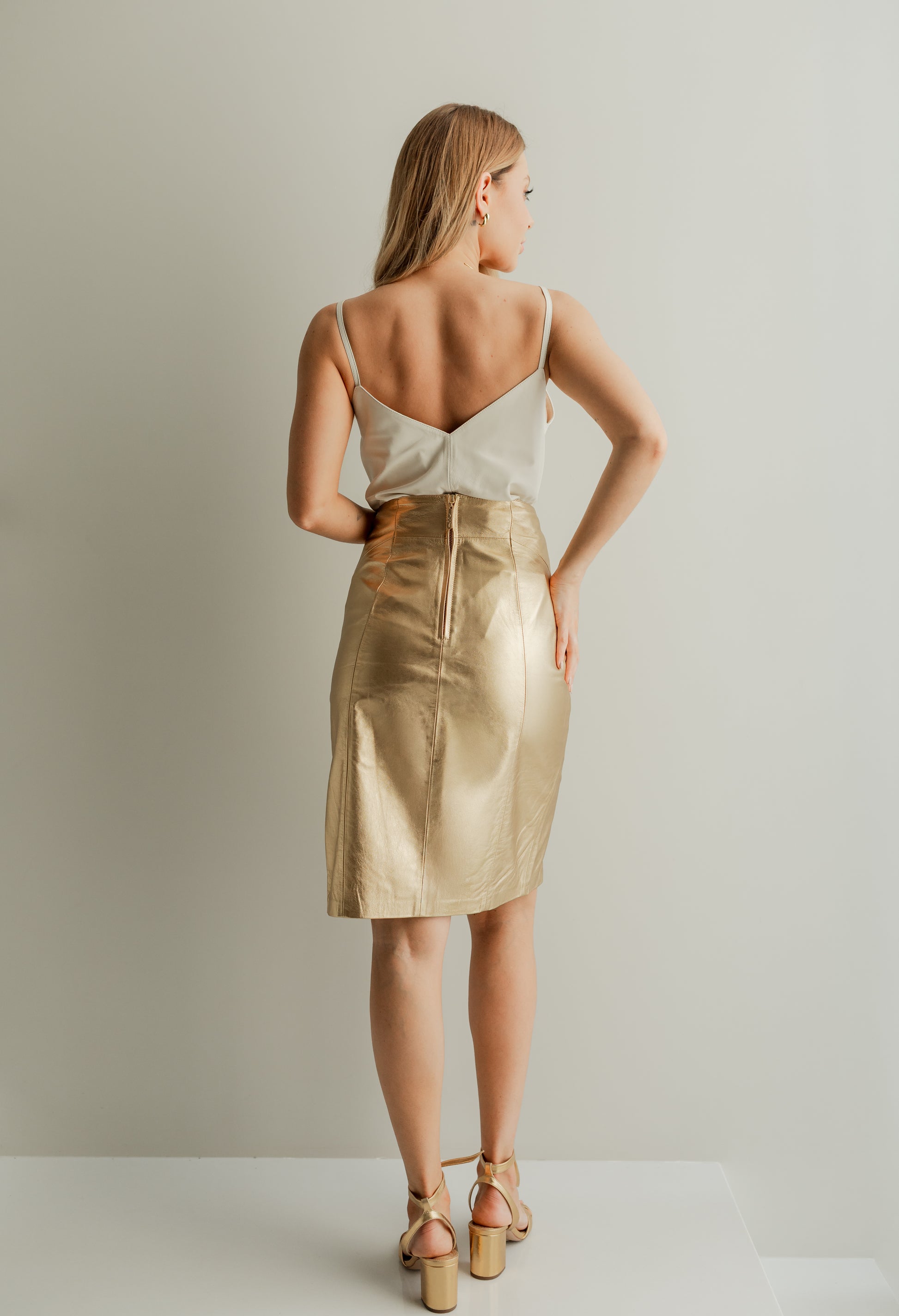 Saia de couro legítimo lápis com fenda - Dourado